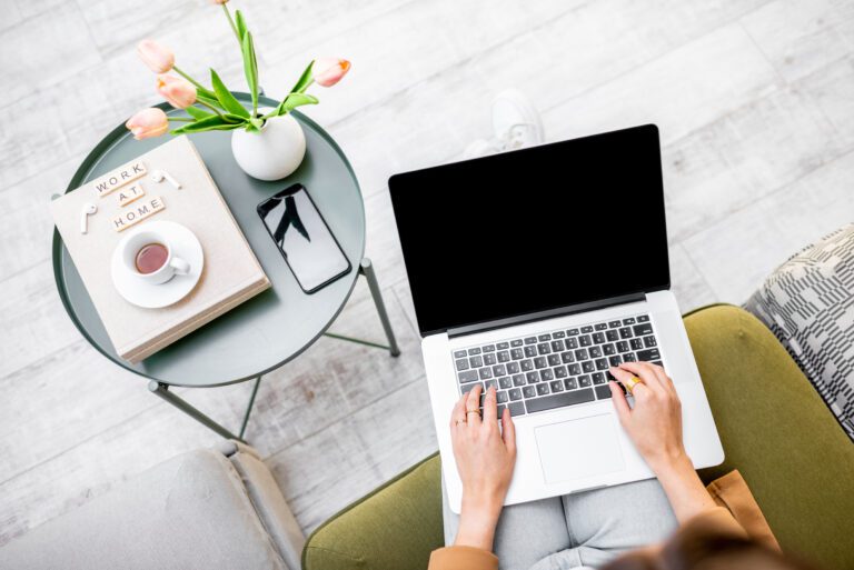 Woman working on computer at home